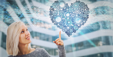 Woman pointing to heart